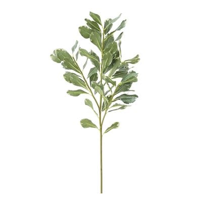 A faux flower greenery branch on a white background.