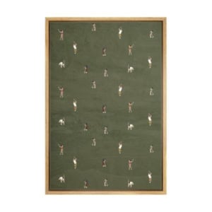 A framed amazon art piece displays small, evenly spaced illustrations of golfers in various poses on a muted green background.