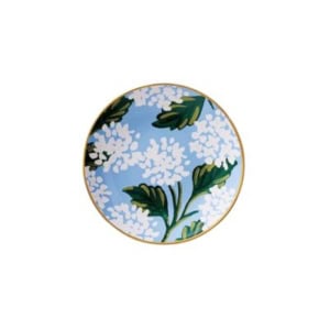 Round decorative plate with a blue background, white floral pattern, green leaves, and a thin gold rim—perfect for nightstand decorating or adding charm to any space.