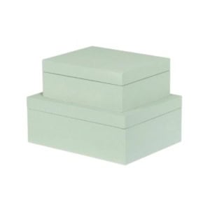 Two light green rectangular boxes, perfect for nightstand decorating, are stacked with the smaller box placed on top of the larger one.