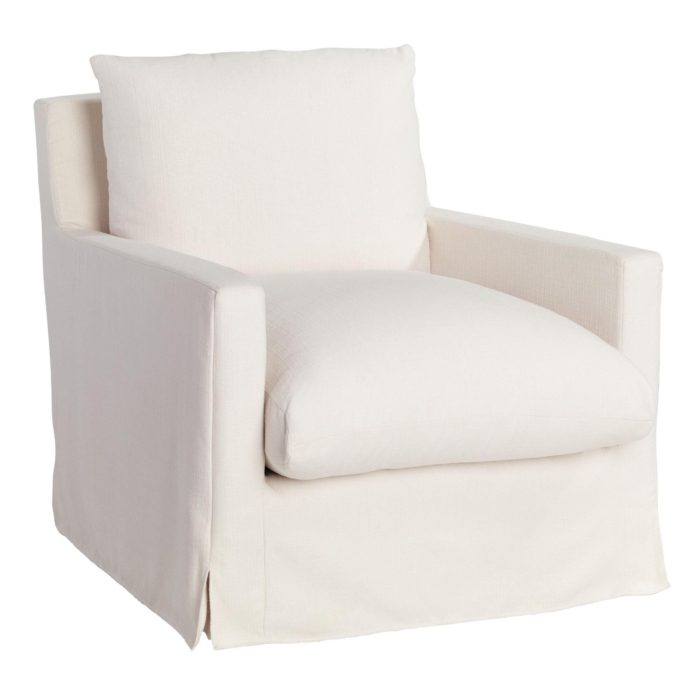 A white slipcovered serena and lily dup chair