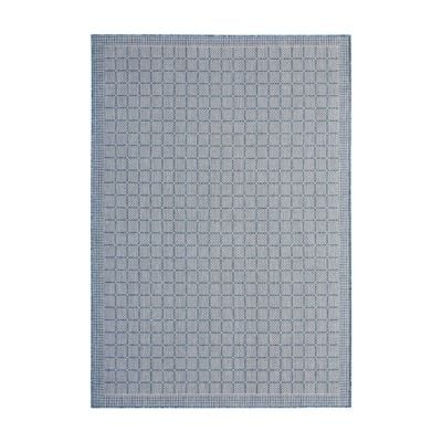 a blue indoor outdoor rug in a checked pattern.