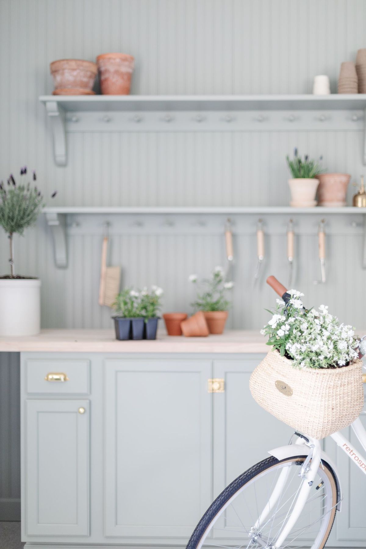 A built-in green bench in the Sherwin Williams Evergreen Fog