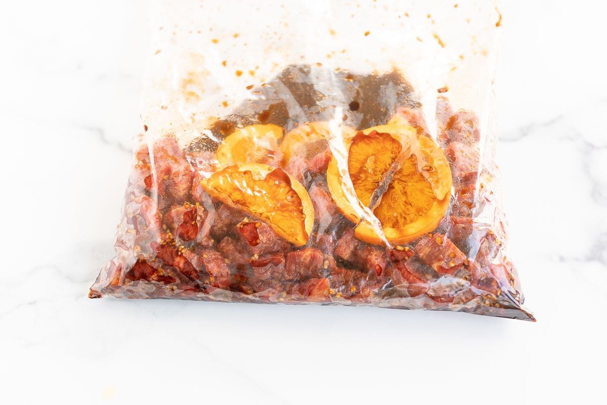 carne asada street taco meat marinating in a bag