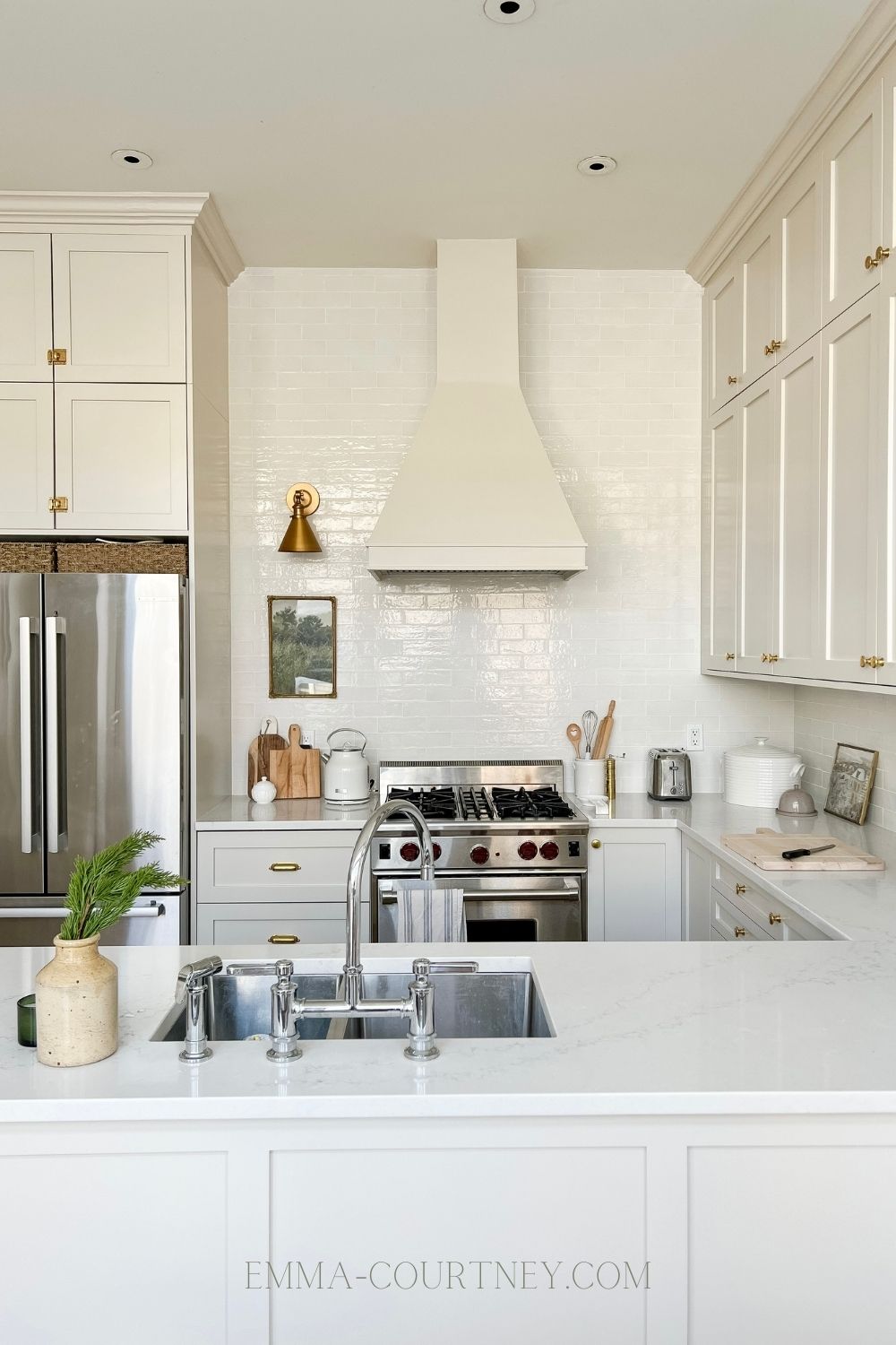 Kitchen with natural cream-painted cabinets by Benjamin Moore