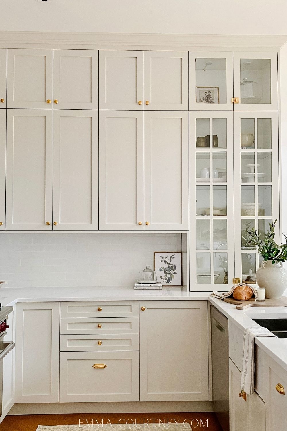 A kitchen with cabinets painted in Benjamin Moore Natural Cream