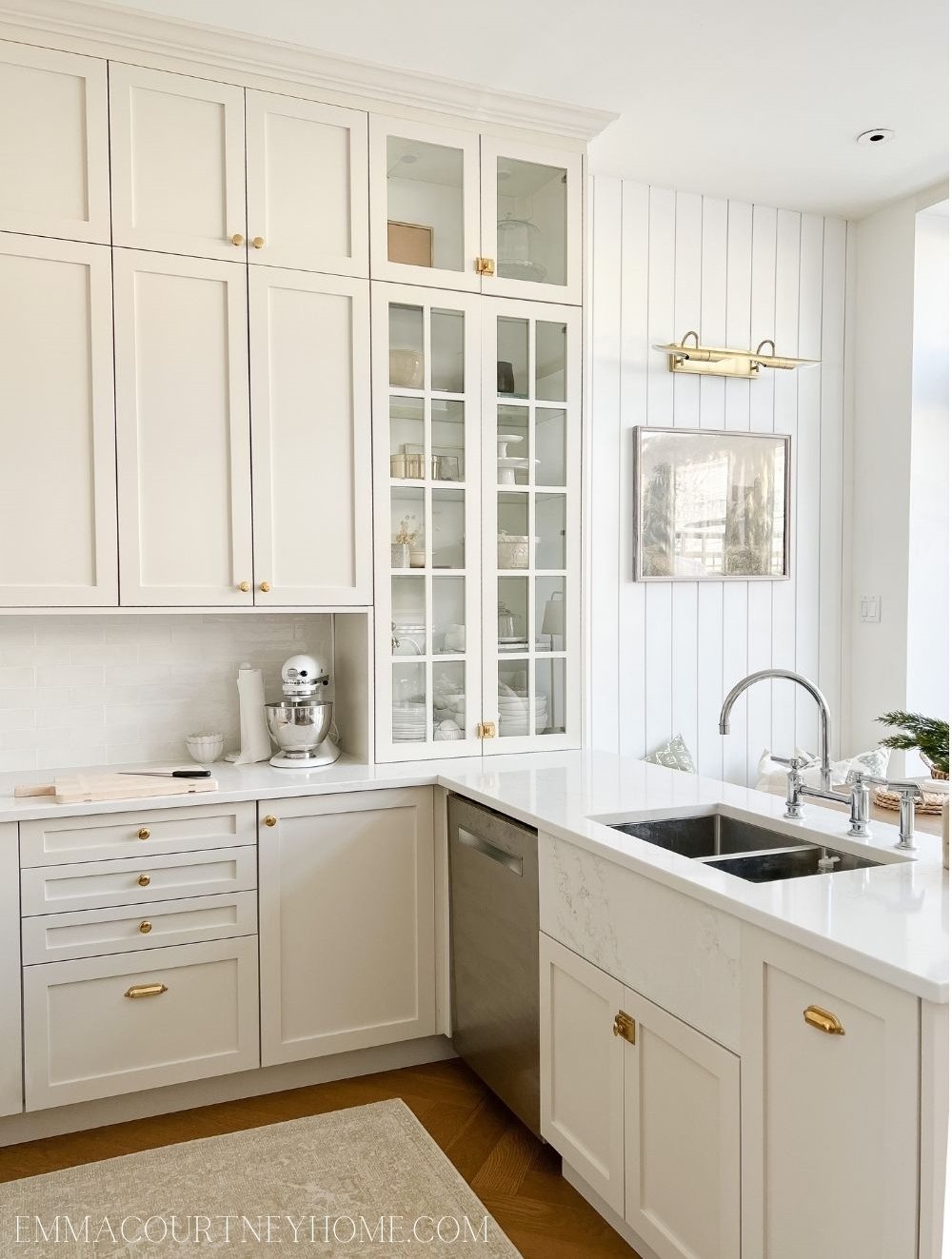 Kitchen with natural cream-painted cabinets by Benjamin Moore