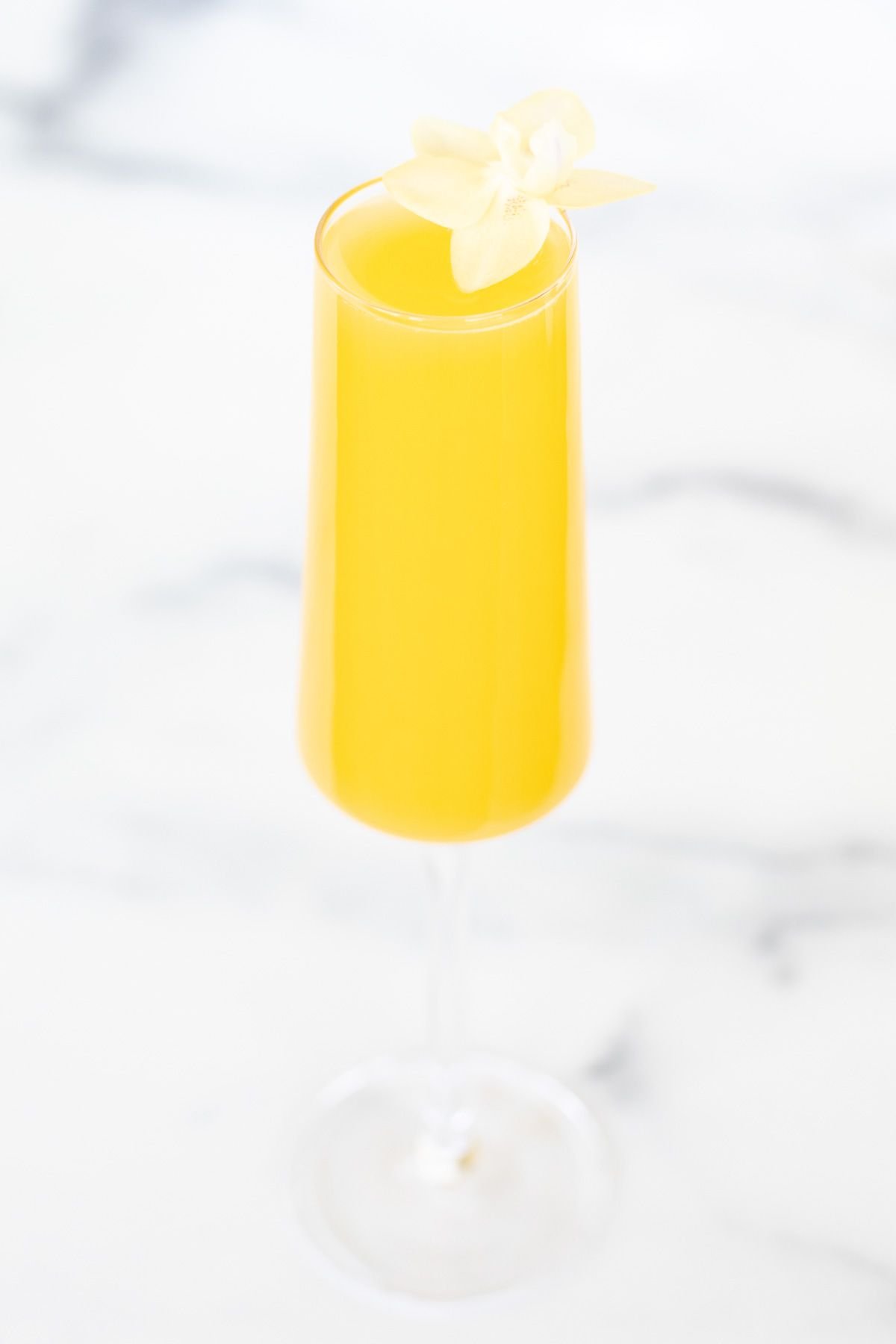 a prosecco mimosa on a marble surface