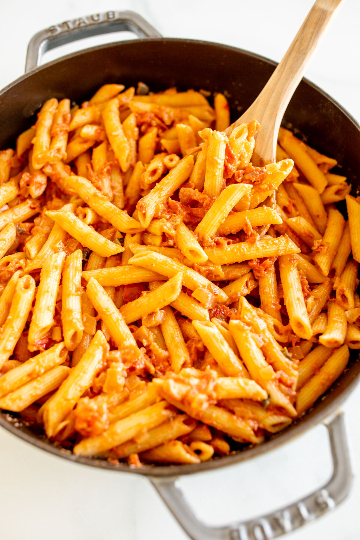 A saute pan filled with penne all vodka.