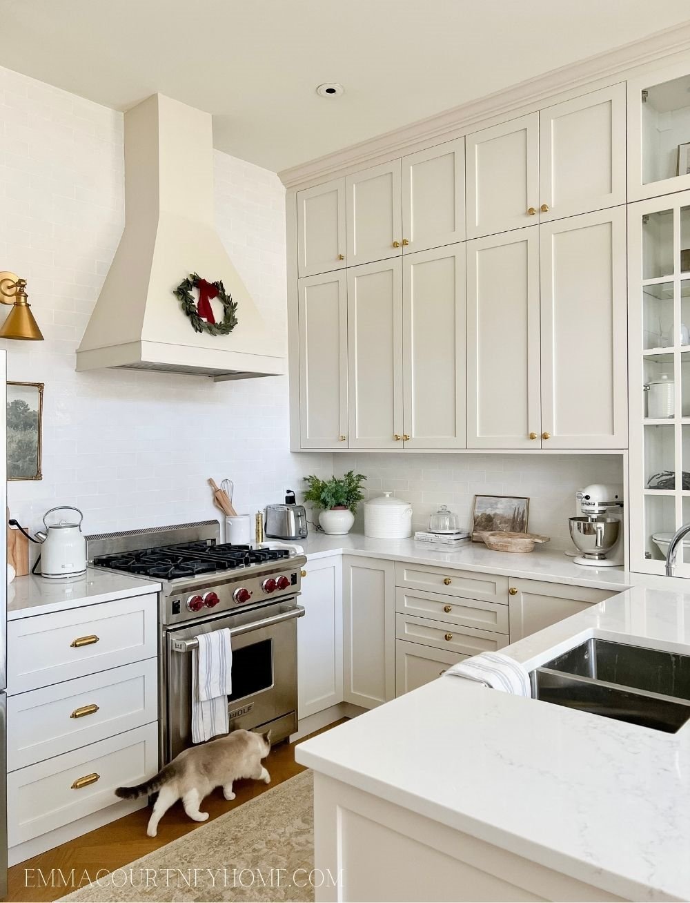 Kitchen with natural cream-painted cabinets by Benjamin Moore