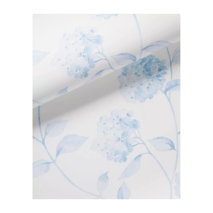 A floral wallpaper by Serena and Lily featuring blue flowers on a white background.