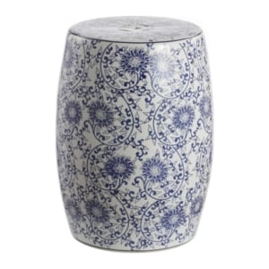 A blue and white ceramic garden stool.