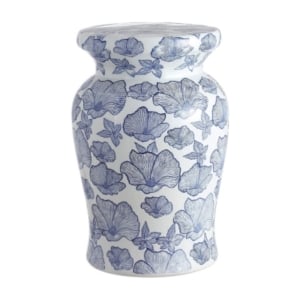 A blue and white ceramic vase with flowers on it.