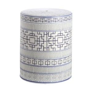 A ceramic container with a geometric design in blue and white.