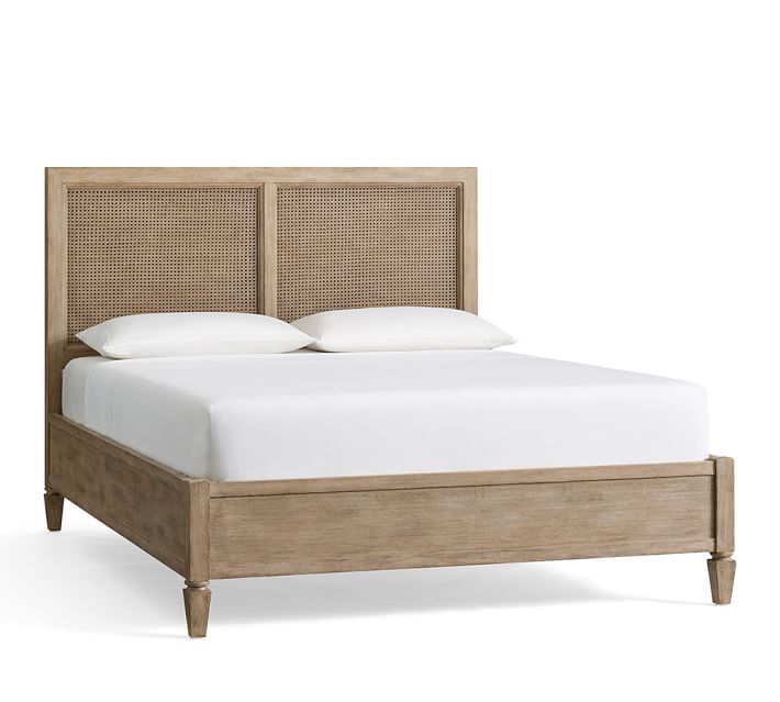 A pottery barn cane bed