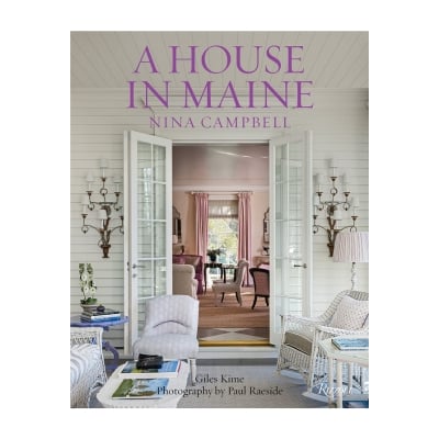 a decorative coffee table book titled "a house in maine"