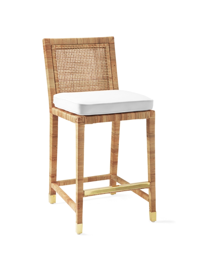 A rattan bar stool against a white background
