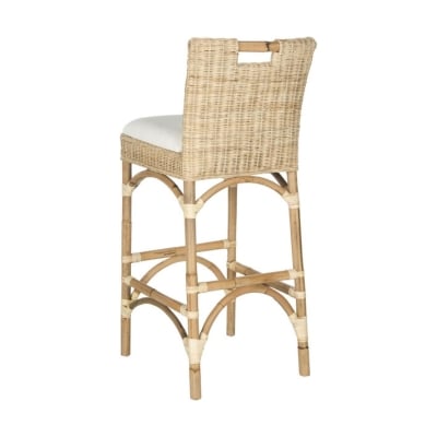 This rattan bar stool features a white cushion for added comfort.