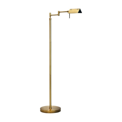 a brass swivel floor lamp