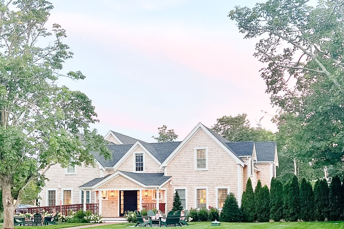 A shingled cottage style exterior of a boutique hotel in a guide to Where to stay on Martha's Vineyard