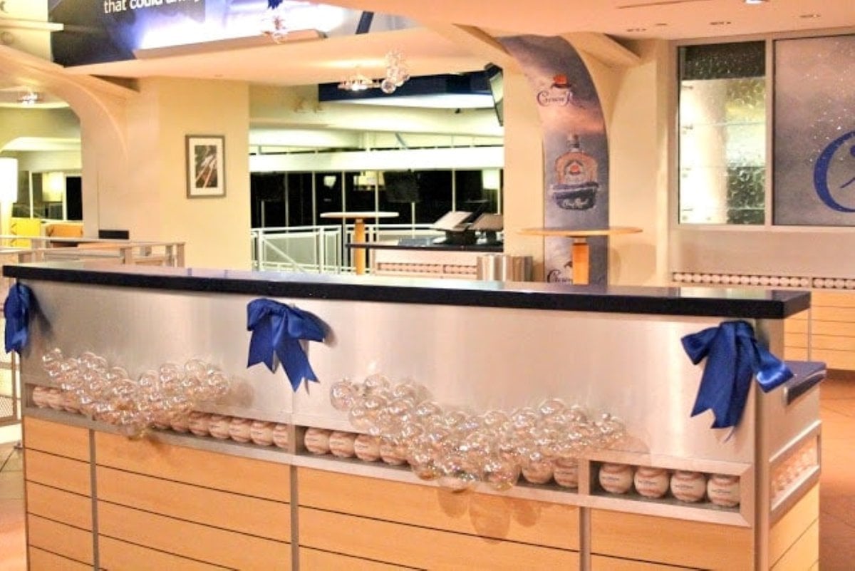 An ornament garland on a light wood bar at the KC Royals stadium in Kansas City