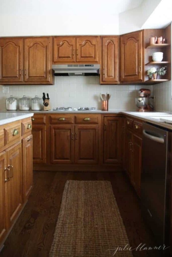 An oak kitchen updated with paint colors that go with oak cabinets.