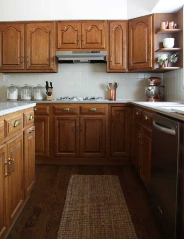 An oak kitchen updated with paint colors that go with oak cabinets.
