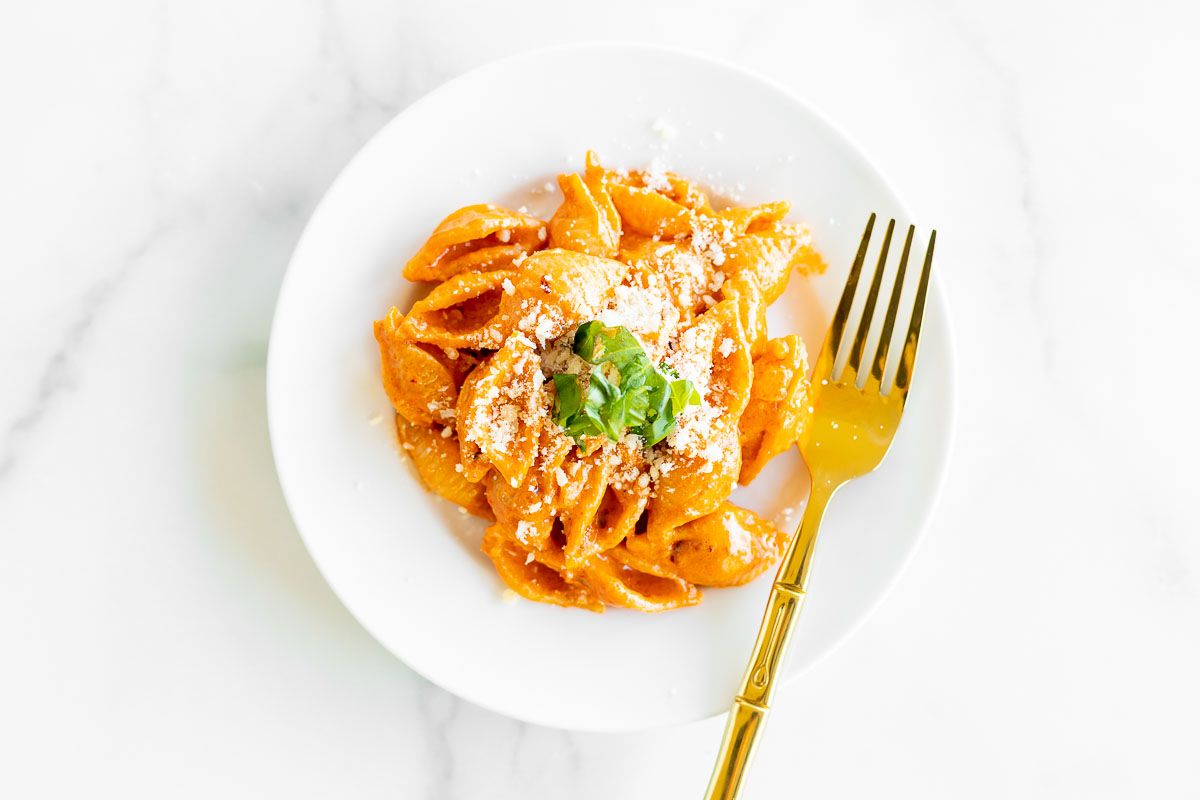 A white plate with a serving of Gigi Hadid pasta, a vodka pasta recipe.