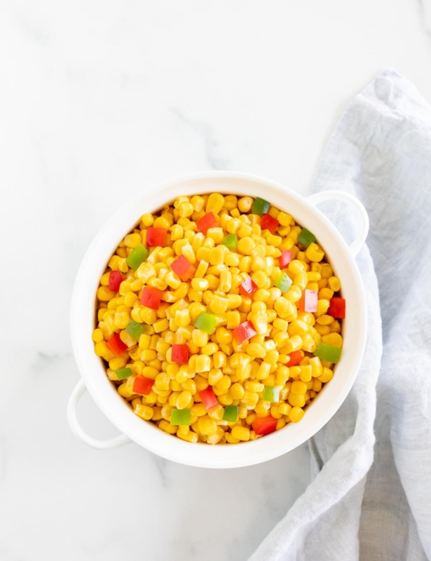 Homemade Mexicorn substitute in a white serving bowl, placed on a white marble countertop.
