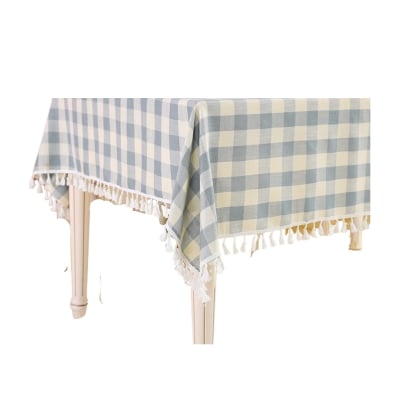 a blue and white checked gingham table cloth. 