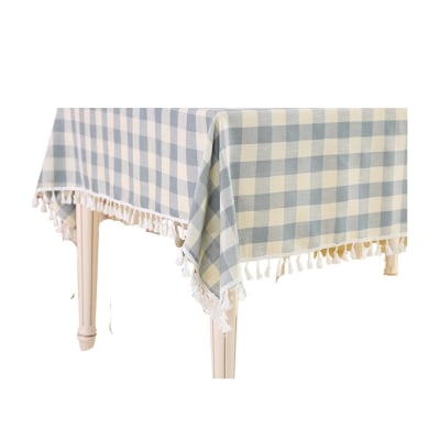 a blue and white checked gingham table cloth.