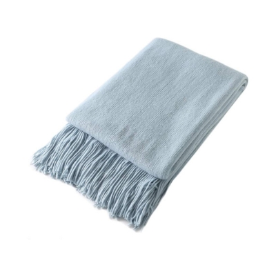 A light blue throw with fringes is available for purchase on Black Friday.