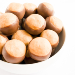Peanut Butter Balls (buckeye recipe) displayed in a white bowl.