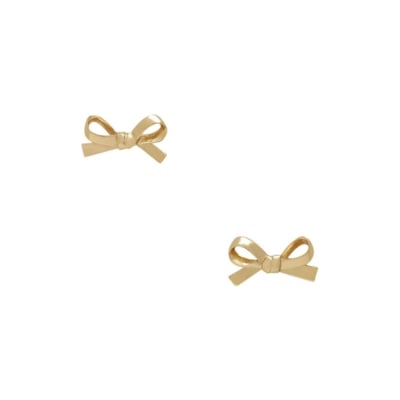 Gift ideas - Two gold bow stud earrings on a white background.
