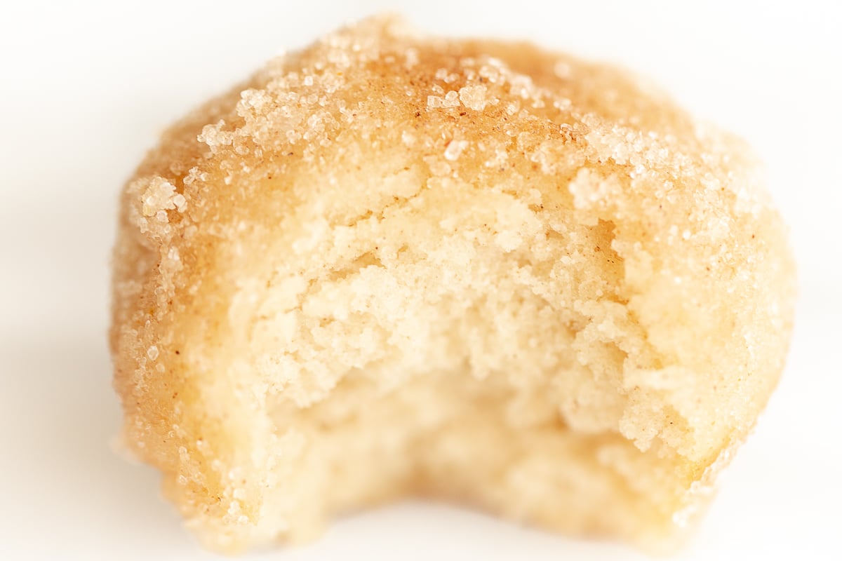 Close up of mini cinnamon muffins, rolled in cinnamon sugar.