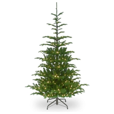 A sparse artificial Christmas tree with lights on a stand against a white background.