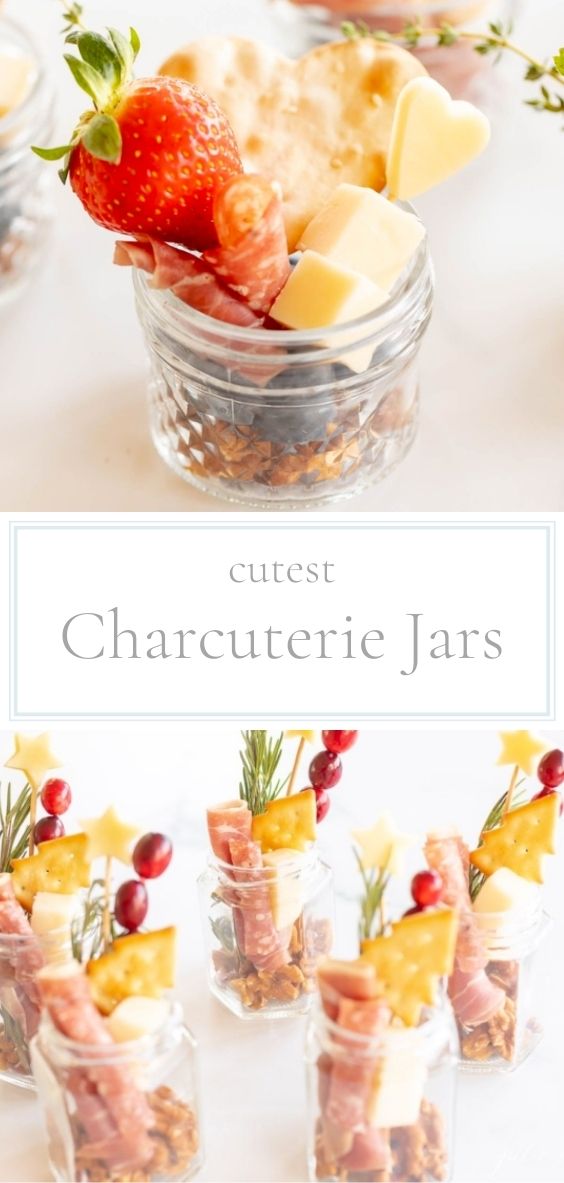 The cutest Charcuterie appetizers are featured in mini jars on a marble counter top.