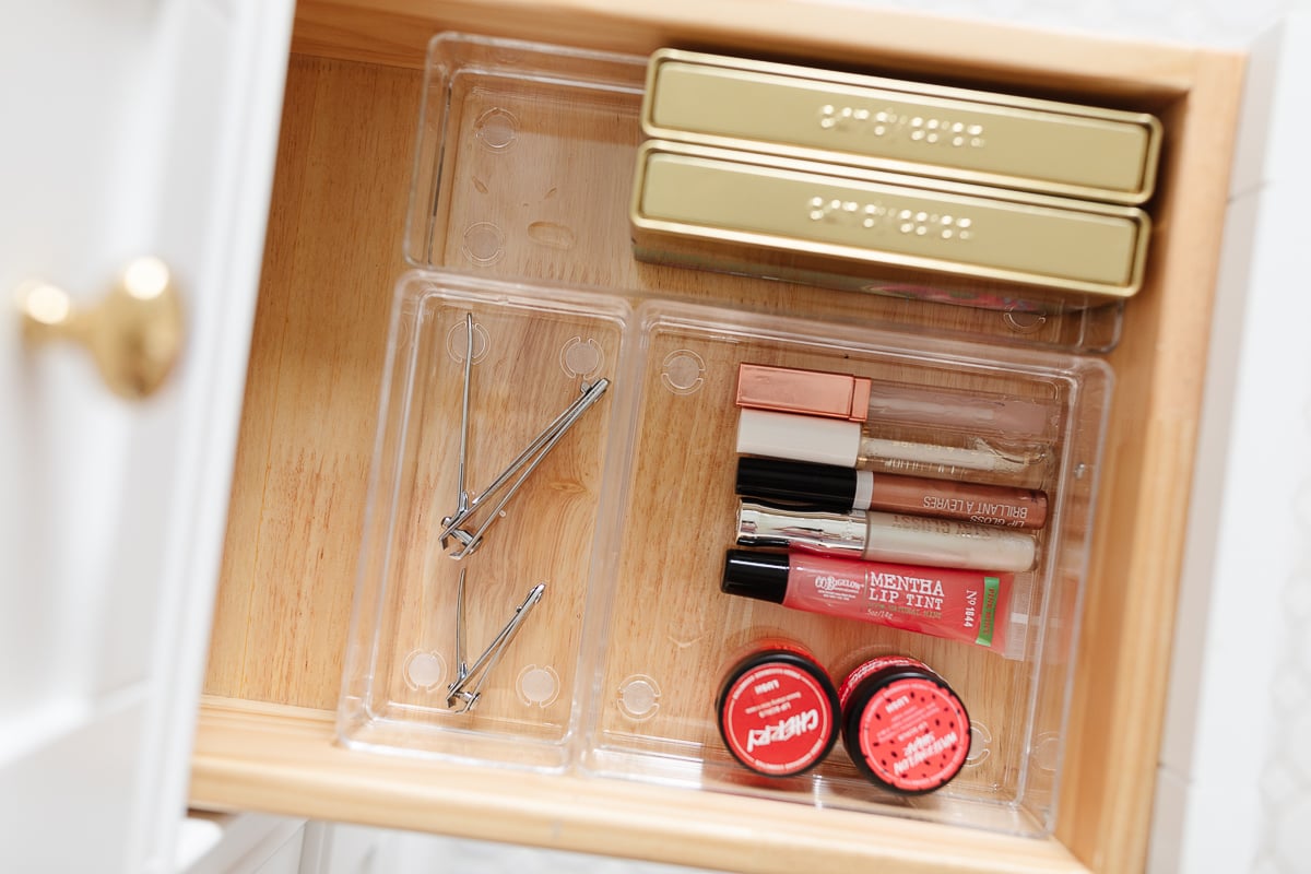 makeup in bathroom drawer in clear organizers