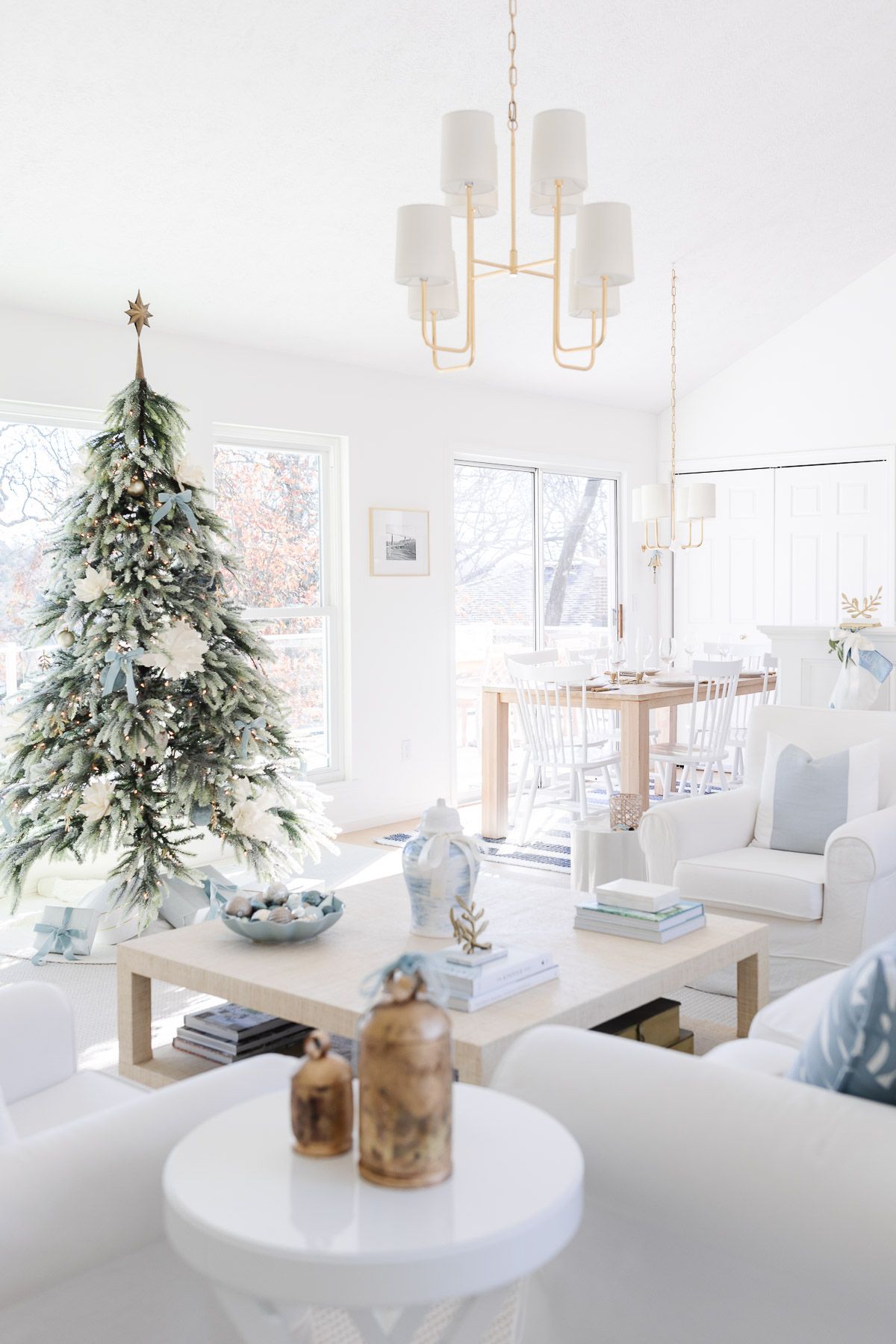 A coastal Christmas tree in a white living room.