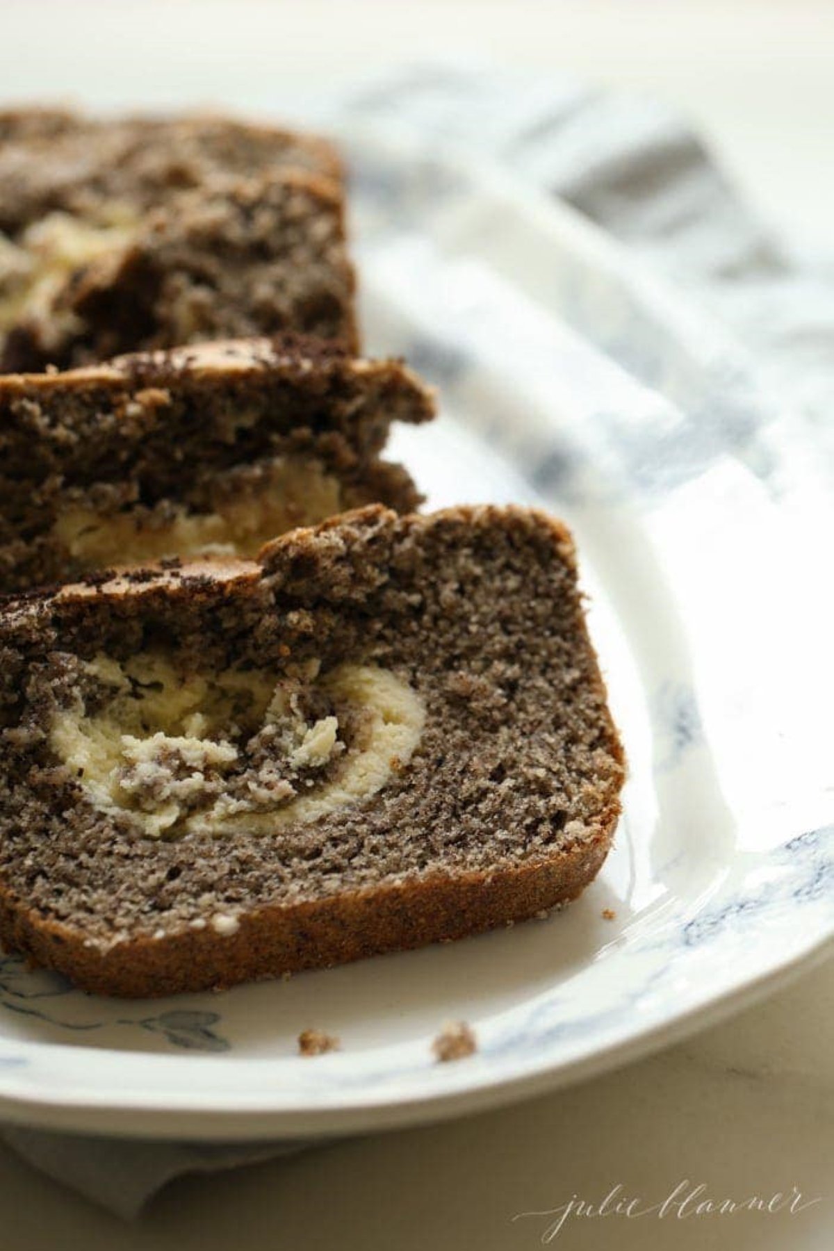 oreo cookies and cream quick bread on a blue and white plate