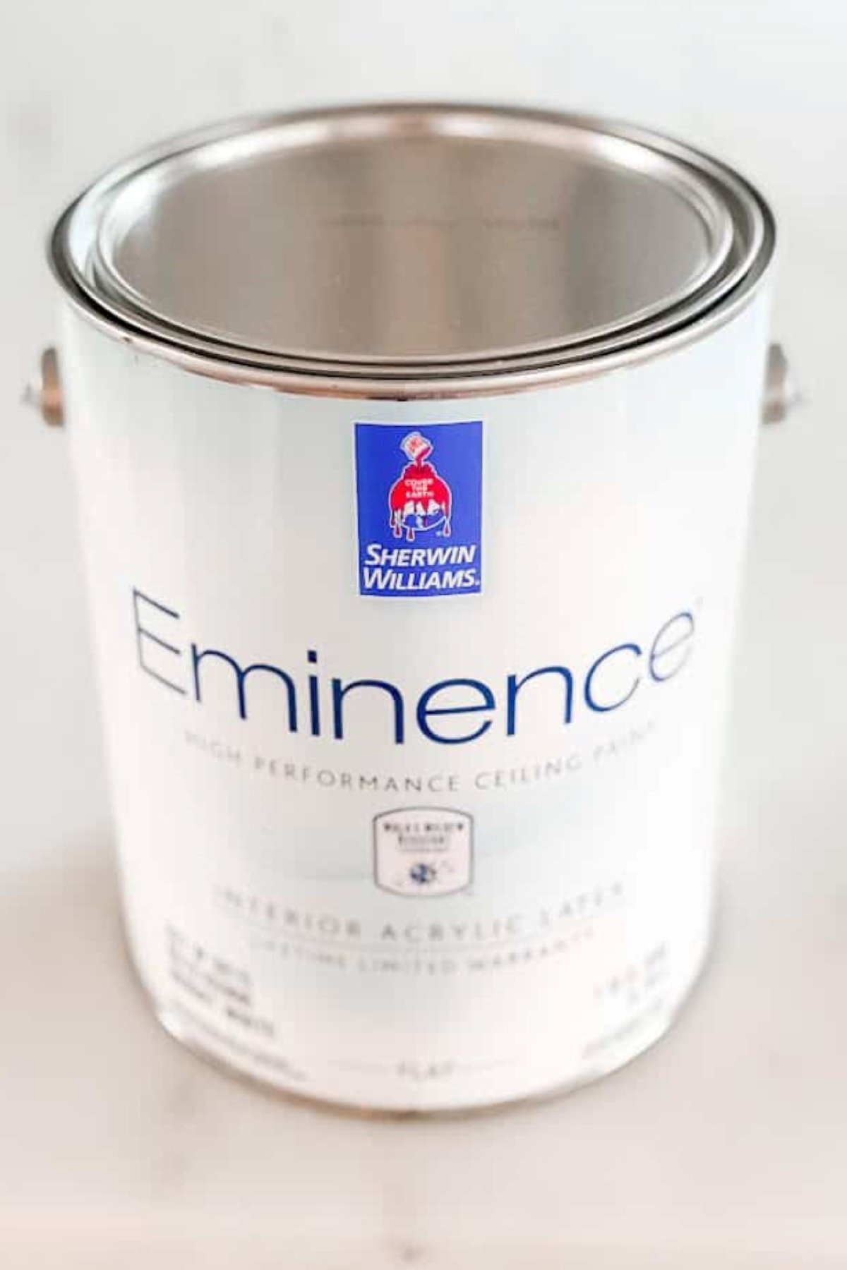 A white can of Sherwin Williams Eminence ceiling paint. 