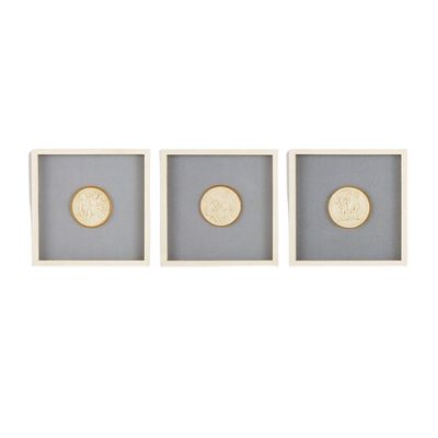 A trio of framed intaglios with a white matting.