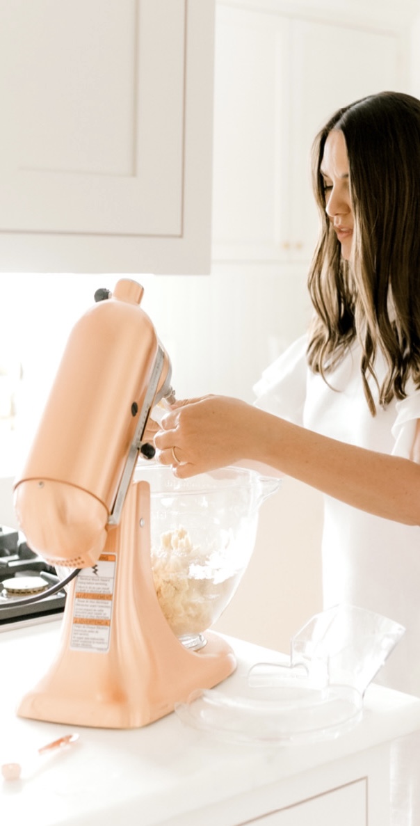 julie blanner in kitchen with copper stand mixer