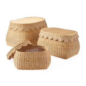 Three wicker baskets with scalloped decor lids on a white background.