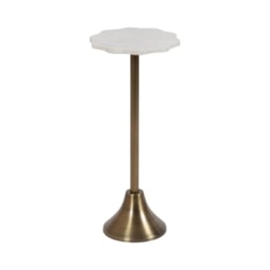 A white table with a scalloped gold base.