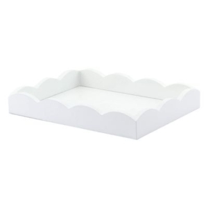A white scalloped decor tray on a white background.