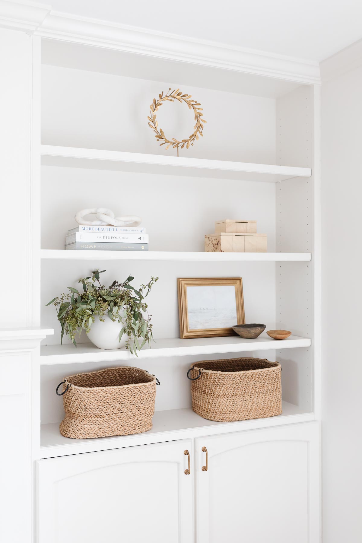 bookshelves with baskets and boxes