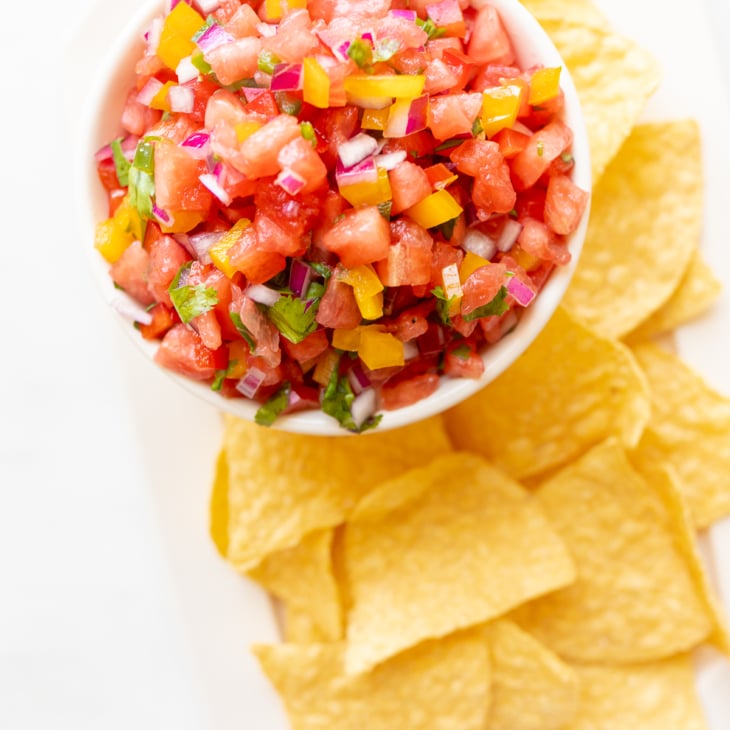 FRUIT SALSA IN A BOWL WITH CHIPS