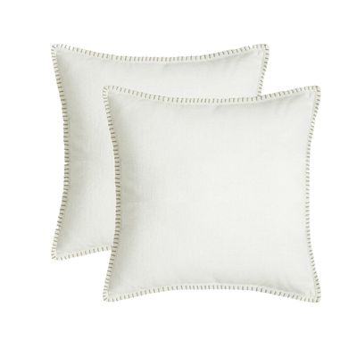 white and gray Amazon pillow covers.