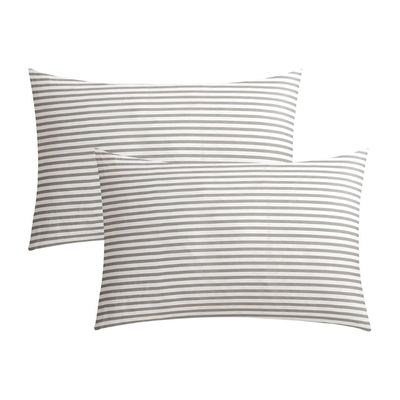 A striped gray and white set of Amazon pillow covers.